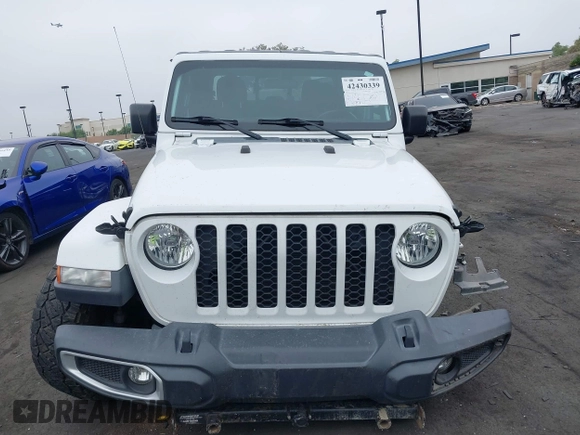 2020 Jeep Gladiator Sport S with VIN 1C6HJTAG9LL194454, listed as a IAAI auction lot 42430339 with 90,461 mi miles and . Bid and sale history available at DreamBid. Image 13.