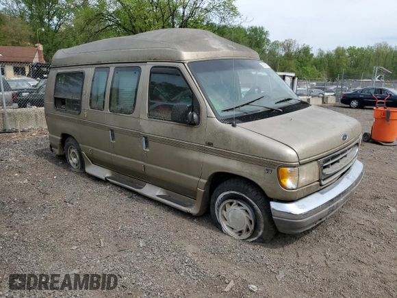 1999 Ford Econoline Cargo with VIN 1FDRE14W5XHB75137, listed as a Copart auction lot 53663605 with 147,149 mi miles and Salvage Title. Bid and sale history available at carsss.com. Image 4.