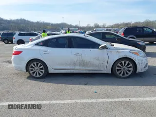 2014 Hyundai Azera Limited with VIN KMHFH4JG8EA390171, listed as a IAAI auction lot 41844326 with 159,884 mi miles and . Bid and sale history available at carsss.com. Image 13.
