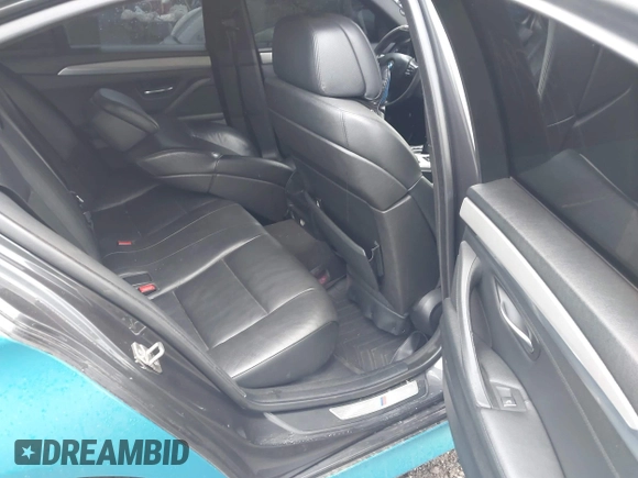 2013 BMW 5 Series 550i with VIN WBAFR9C52DDX79795, listed as a IAAI auction lot 41868996 with 155,783 mi miles and . Bid and sale history available at carsss.com. Image 8.
