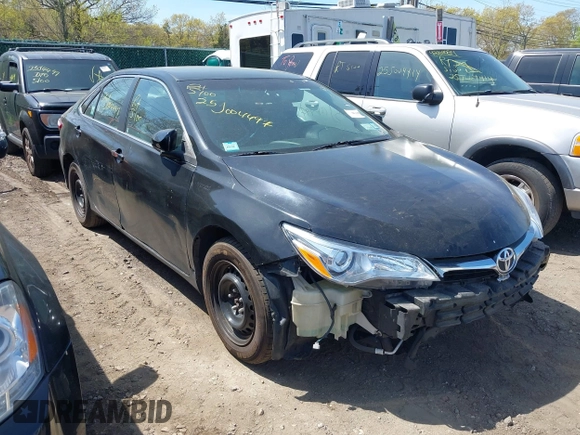 2015 Toyota Camry LE z VIN 4T1BD1FK7FU159767, wystawiony jako IAAI lot #42175153 z przebiegiem Nie podano mil oraz . Historia ofert i sprzedaży dostępna na DreamBid. Obrazek 1.