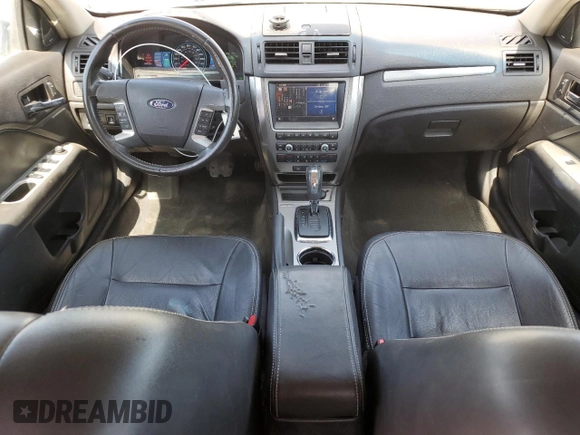 2011 Ford Fusion Hybrid с VIN 3FADP0L36BR251407, выставлен на аукционе Copart как лот 57838085 с пробегом 129 972 миль миль и Чистый • Clean title. История ставок и продаж доступна на DreamBid. Изображение 8.