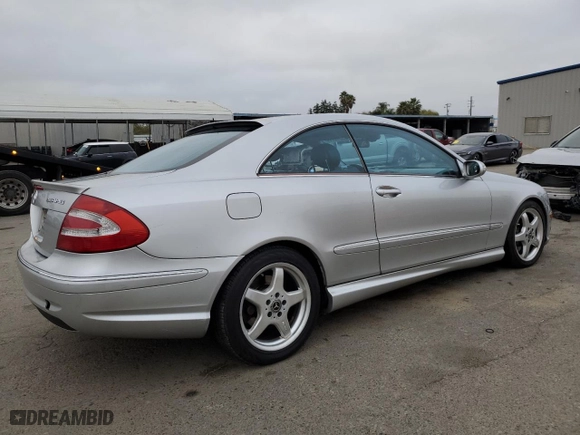 2004 Mercedes-Benz CLK-Class 5.0L with VIN WDBTJ75J04F110990, listed as a Copart auction lot 85511414 with 251,096 mi miles and Salvage Title. Bid and sale history available at carsss.com. Image 3.