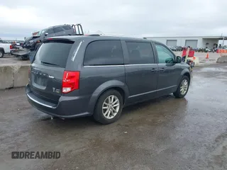 2019 Dodge Grand Caravan SXT with VIN 2C4RDGCG3KR543221, listed as a IAAI auction lot 41528859 with 129,778 mi miles and . Bid and sale history available at DreamBid. Image 4.