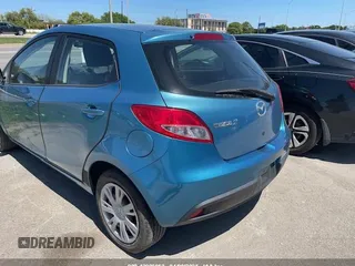 2011 Mazda 2 Sport with VIN JM1DE1HY7B0116561, listed as a IAAI auction lot 42006952 with 139,369 mi miles. Bid and sale history available at carsss.com. Image 3.