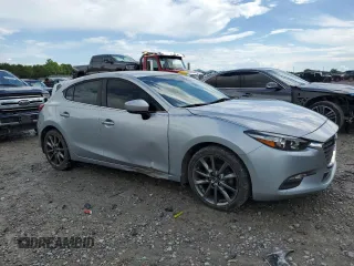 2018 Mazda 3 Touring z VIN 3MZBN1L30JM164074, wystawiony jako Copart lot #56741745 z przebiegiem 86 812 mil mil oraz Szkoda całkowita • Salvage title. Historia ofert i sprzedaży dostępna na DreamBid. Obrazek 4.