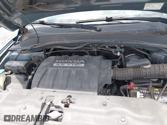 2005 Honda Pilot EX-L with VIN 5FNYF18595B050248, listed as a IAAI auction lot 42474308 with 311,580 mi miles and . Bid and sale history available at DreamBid. Image 10.