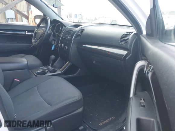 2012 Kia Sorento LX with VIN 5XYKT3A61CG235882, listed as a IAAI auction lot 41720081 with 136,282 mi miles. Bid and sale history available at carsss.com. Image 5.
