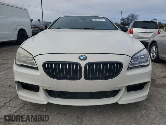 2017 BMW 6 Series 650i with VIN WBA6D4C54HD977706, listed as a Copart auction lot 79116554 with 87,039 mi miles and Salvage Title. Bid and sale history available at carsss.com. Image 5.