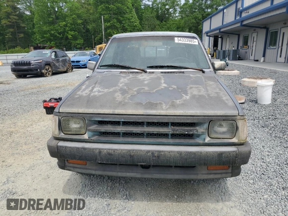 1992 Mazda B-Series Truck with VIN JM2UF3137N0287091, listed as a Copart auction lot 54333985 with 217,747 mi miles and Clean Title. Bid and sale history available at DreamBid. Image 5.