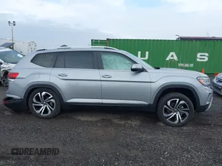 2023 Volkswagen Atlas SEL z VIN 1V2BR2CA9PC502866, wystawiony jako IAAI lot #41877062 z przebiegiem 18 605 mil mil oraz . Historia ofert i sprzedaży dostępna na DreamBid. Obrazek 13.