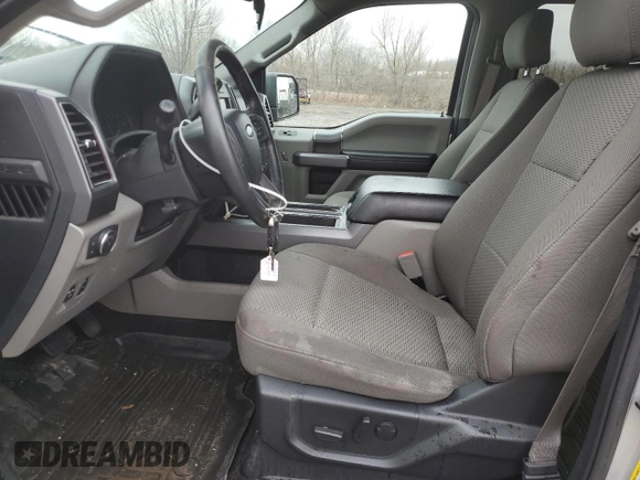 2019 Ford F-150 XL with VIN 1FTEW1EB8KFC61719, listed as a Copart auction lot 47276065 with 160,016 mi miles and Salvage Title. Bid and sale history available at DreamBid. Image 7.