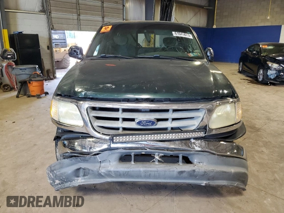 2002 Ford F-150 XL z VIN 1FTRX172X2NA10475, wystawiony jako Copart lot #61645655 z przebiegiem Nie podano mil oraz Szkoda całkowita • Salvage title. Historia ofert i sprzedaży dostępna na DreamBid. Obrazek 5.