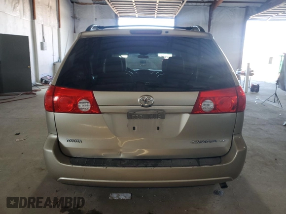 2010 Toyota Sienna CE with VIN 5TDKK4CC3AS331556, listed as a Copart auction lot 46590115 with 151,835 mi miles and Salvage Title. Bid and sale history available at DreamBid. Image 6.