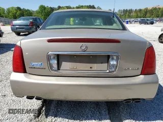 2003 Cadillac DeVille z VIN 1G6KD54Y63U250482, wystawiony jako Copart lot #52164515 z przebiegiem 131 376 mil mil oraz Szkoda całkowita • Salvage title. Historia ofert i sprzedaży dostępna na DreamBid. Obrazek 6.