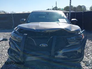 2021 Ford Police Interceptor z VIN 1FM5K8ACXMNA03127, wystawiony jako IAAI lot #41732905 z przebiegiem 73 398 mil mil oraz . Historia ofert i sprzedaży dostępna na DreamBid. Obrazek 13.