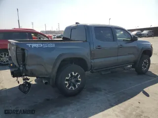 2022 Toyota Tacoma 4WD SR with VIN 3TMCZ5AN6NM511288, listed as a Copart auction lot 50429285 with 33,740 mi miles and Salvage Title. Bid and sale history available at carsss.com. Image 3.
