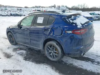 2021 Alfa Romeo Stelvio Ti with VIN ZASPAKBN1M7D09433, listed as a IAAI auction lot 41378468 with 31,717 mi miles. Bid and sale history available at carsss.com. Image 3.
