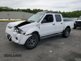 2003 Nissan Frontier XE with VIN 1N6ED27TX3C448980, listed as a Copart auction lot 58802985 with 99,999 mi miles and Salvage title. Bid and sale history available at DreamBid. Image 1.