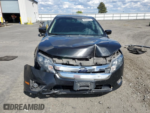 2012 Ford Fusion SE with VIN 3FAHP0HA3CR327756, listed as a Copart auction lot 58384915 with 124,406 mi miles and Salvage title. Bid and sale history available at DreamBid. Image 5.