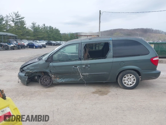 2003 Dodge Grand Caravan with VIN 2D4GP44313R240791, listed as a IAAI auction lot 41937009 with 231,913 mi miles and . Bid and sale history available at DreamBid. Image 13.