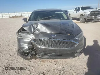 2018 Ford Fusion Titanium с VIN 3FA6P0K94JR158639, выставлен на аукционе Copart как лот 49331265 с пробегом 97 782 миль миль и Списание • Salvage title. История ставок и продаж доступна на DreamBid. Изображение 5.