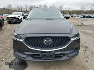 2017 Mazda CX-5 Grand Touring with VIN JM3KFBDL7H0204658, listed as a Copart auction lot 54007165 with 154,546 mi miles and Salvage Title. Bid and sale history available at carsss.com. Image 5.