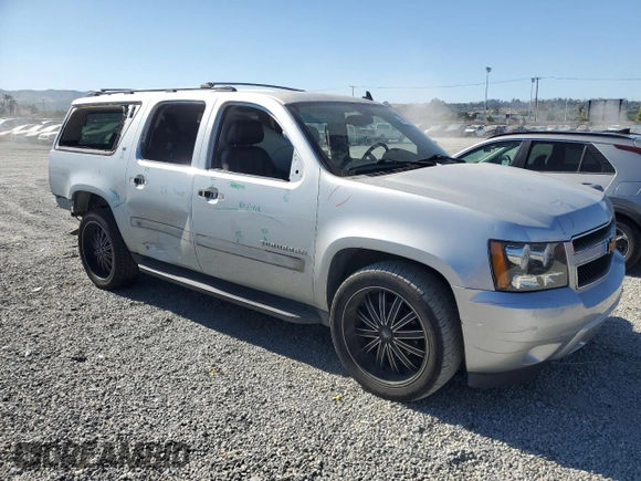 2013 Chevrolet Suburban LT with VIN 1GNSCJE05DR371789, listed as a Copart auction lot 60755775 with 233,275 mi miles and Salvage title. Bid and sale history available at DreamBid. Image 4.