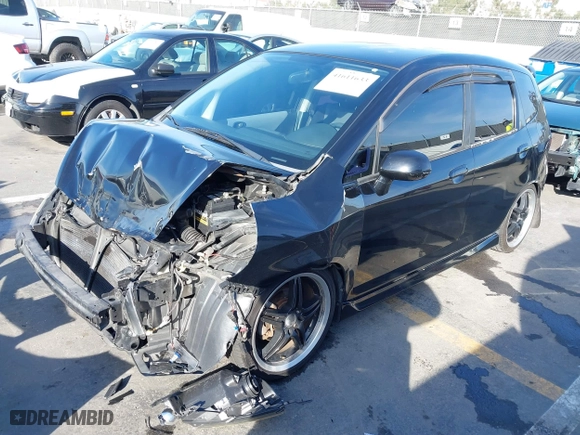 2007 Honda Fit with VIN JHMGD38497S060481, listed as a IAAI auction lot 41611633 with 128574 miles. Bid and sale history available at carsss.com. Image 16.