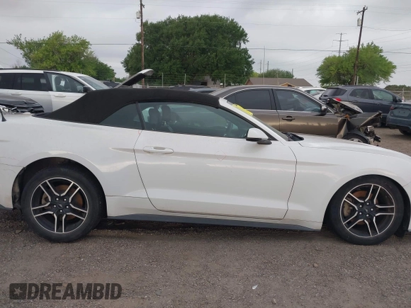 2020 Ford Mustang EcoBoost z VIN 1FATP8UH4L5120002, wystawiony jako IAAI lot #41977618 z przebiegiem 63 570 mil mil oraz . Historia ofert i sprzedaży dostępna na DreamBid. Obrazek 14.