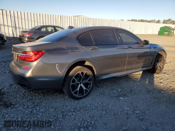 2017 BMW 7 Series with VIN WBA7F2C32HG422866, listed as a Copart auction lot 76177184 with 146,565 mi miles and Salvage Title. Bid and sale history available at DreamBid. Image 3.