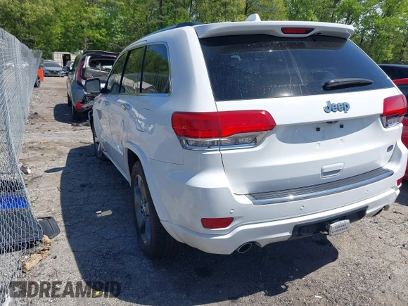 2015 Jeep Grand Cherokee Overland with VIN 1C4RJECG6FC707458, listed as a IAAI auction lot 41996350 with 128,307 mi miles and . Bid and sale history available at DreamBid. Image 3.