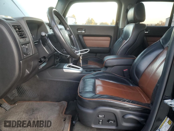 2006 Hummer H3 with VIN 5GTDN136X68128886, listed as a Copart auction lot 42032335 with 145,808 mi miles and Salvage Title. Bid and sale history available at DreamBid. Image 7.