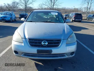 2004 Nissan Altima S with VIN 1N4AL11DX4C147777, listed as a IAAI auction lot 41646134 with 124,023 mi miles. Bid and sale history available at carsss.com. Image 12.