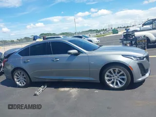 2023 Cadillac CT5 Luxury z VIN 1G6DW5RK3P0106764, wystawiony jako IAAI lot #42491584 z przebiegiem 32 223 mil mil oraz . Historia ofert i sprzedaży dostępna na DreamBid. Obrazek 13.