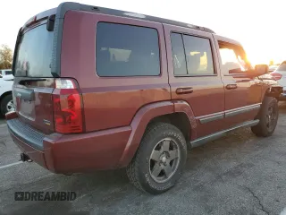 2007 Jeep Commander Sport z VIN 1J8HG48P17C601121, wystawiony jako Copart lot #41482495 z przebiegiem 199 263 mil mil oraz Szkoda całkowita • Salvage title. Historia ofert i sprzedaży dostępna na DreamBid. Obrazek 3.