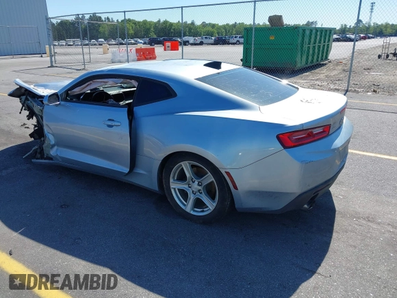 2018 Chevrolet Camaro 1LT z VIN 1G1FB1RX3J0125112, wystawiony jako IAAI lot #42034286 z przebiegiem 179 149 mil mil oraz . Historia ofert i sprzedaży dostępna na DreamBid. Obrazek 3.