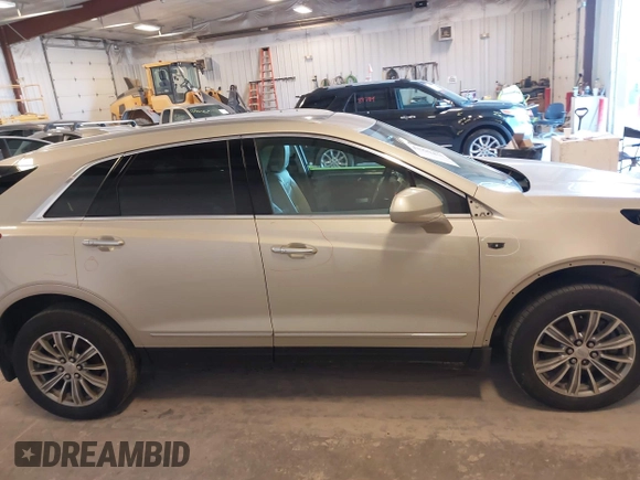 2017 Cadillac XT5 Luxury AWD z VIN 1GYKNDRS1HZ160606, wystawiony jako IAAI lot #41990425 z przebiegiem 130 822 mil mil oraz . Historia ofert i sprzedaży dostępna na DreamBid. Obrazek 13.