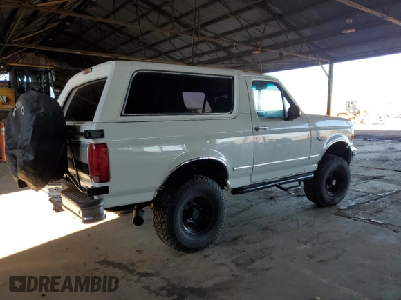 1993 Ford Bronco Custom with VIN 1FMEU15H4PLA36423, listed as a Copart auction lot 49184115 with 203,042 mi miles and Salvage Title. Bid and sale history available at carsss.com. Image 3.