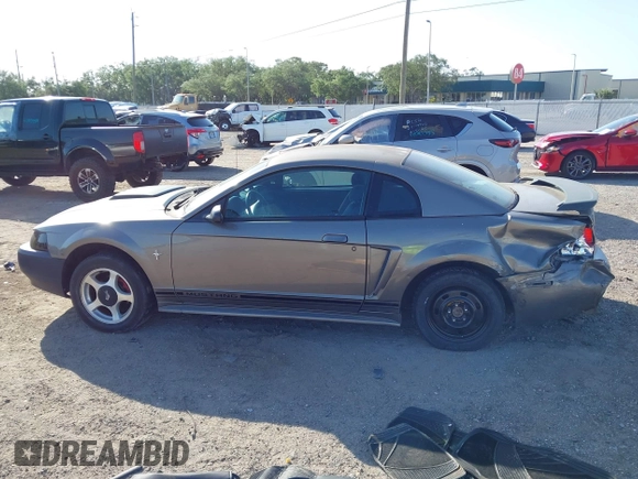 2001 Ford Mustang Standard with VIN 1FAFP40461F264327, listed as a IAAI auction lot 42002990 with 316,107 mi miles. Bid and sale history available at carsss.com. Image 13.