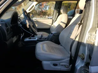 2004 Jeep Liberty Limited with VIN 1J4GK58K24W174385, listed as a Copart auction lot 82787014 with 72,109 mi miles and Salvage title. Bid and sale history available at DreamBid. Image 7.