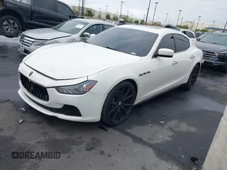 2014 Maserati Ghibli S Q4 with VIN ZAM57RTA3E1090350, listed as a IAAI auction lot 42056682 with 119,160 mi miles and . Bid and sale history available at DreamBid. Image 20.
