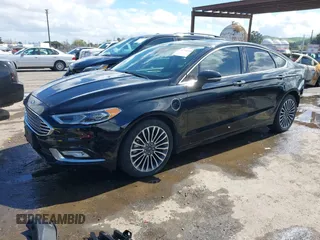 2017 Ford Fusion Titanium with VIN 3FA6P0SU0HR277268, listed as a IAAI auction lot 41798990 with 140,452 mi miles and . Bid and sale history available at DreamBid. Image 18.
