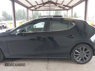 2019 Mazda Mazda3 Hatchback with VIN JM1BPBJM1K1134076, listed as a IAAI auction lot 41643876 with 69,641 mi miles. Bid and sale history available at carsss.com. Image 14.