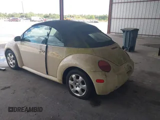 2003 Volkswagen Beetle GLS z VIN 3VWCK21Y33M309841, wystawiony jako IAAI lot #41883298 z przebiegiem 169 430 mil mil oraz . Historia ofert i sprzedaży dostępna na DreamBid. Obrazek 3.