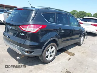2014 Ford Escape SE z VIN 1FMCU0G96EUD57930, wystawiony jako IAAI lot #42347567 z przebiegiem 169 128 mil mil oraz . Historia ofert i sprzedaży dostępna na DreamBid. Obrazek 4.