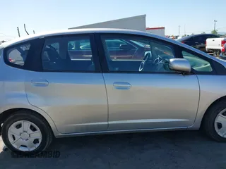 2013 Honda Fit with VIN JHMGE8H31DC042192, listed as a IAAI auction lot 42036582 with 63,223 mi miles. Bid and sale history available at carsss.com. Image 13.