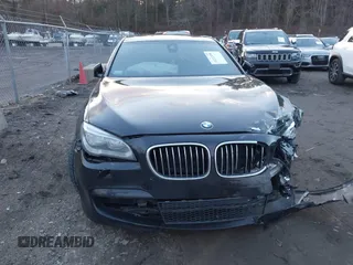 2015 BMW 7 Series 740Li xDrive with VIN WBAYF4C51FGS99074, listed as a IAAI auction lot 41222498 with 132,789 mi miles. Bid and sale history available at carsss.com. Image 12.