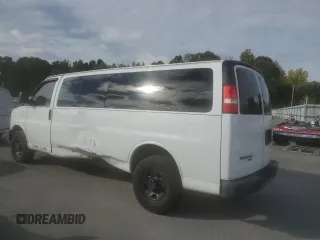 2014 Chevrolet Express Passenger 1LS with VIN 1GAZGZFAXE1105162, listed as a Copart auction lot 72773154 with 97,950 mi miles and Salvage title. Bid and sale history available at DreamBid. Image 2.
