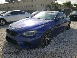 2013 BMW M6 z VIN WBSLX9C56DD159858, wystawiony jako Copart lot #36140122 z przebiegiem 70 246 mil mil oraz Szkoda całkowita • Salvage title. Historia ofert i sprzedaży dostępna na DreamBid. Obrazek 2.